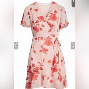 Pink floral wrap mini dress with short sleeves